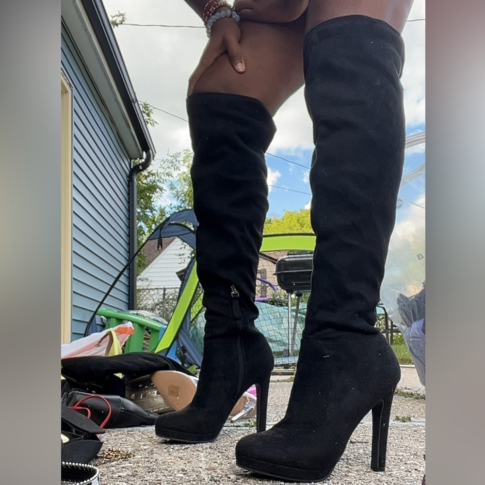 Black thigh high boots